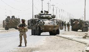 Japan troop vehicle damaged in suspected attack in Iraq