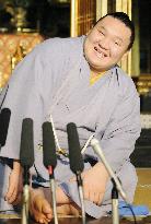 Mongolian yokozuna Hakuho speaks to reporters