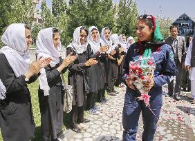 Afghan ex-refugee female pilot arrives in Kabul