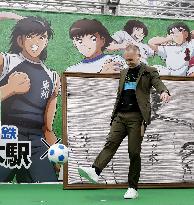 Tokyo train station featuring "Captain Tsubasa"