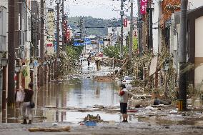 Torrential rain triggers massive flooding in southwestern Japan