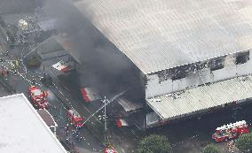 4 missing after warehouse fire in central Japan