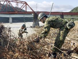 Search operations in flood-hit southwestern Japan