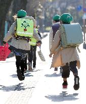 Some schools in Japan resume classes after virus-prompted closures