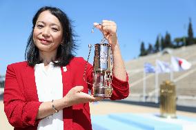 Olympic flame handed over to Japan