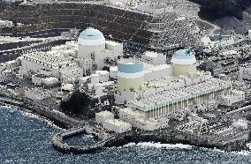 Court orders suspension of Ehime nuclear reactor