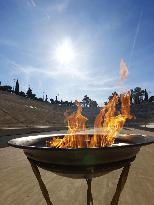 Olympic flame arrives at 1896 stadium