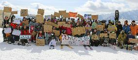 CORRECTED: Climate rally in central Japan ski resort