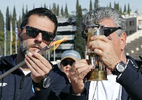 Olympic flame arrives at 1896 stadium