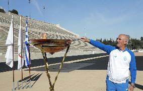 Olympic flame arrives at 1896 stadium