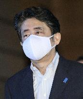 Japan PM Abe wears larger cloth mask