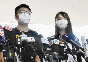 Hong Kong pro-democracy activists Agnes Chow, Joshua Wong