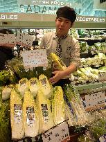 Rice farmer-to-be learns about consumer preferences at store