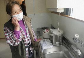 Tsunami survivors begin moving into temporary housing