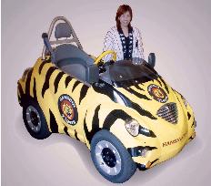 Takara releases Tigers version of electric vehicle Qi