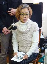 Japan says online image of hostage's body likely authentic