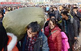 People returning home for Chinese Lunar New Year