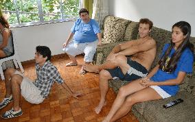 Tourists relax at cheap hotel in favela