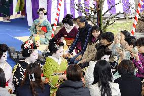 Geisha welcome visitors to plum blossom festival