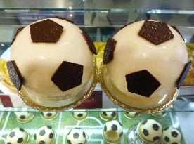 Soccer ball-shaped cake