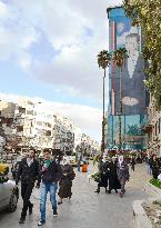 Huge Assad portrait hangs in Damascus