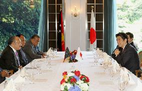 PMs of Japan, Papua New Guinea meet in Tokyo