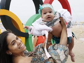 Baby with ribbon, earrings