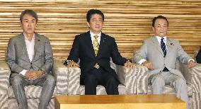 Abe keeps key senior vice ministers amid security challenges