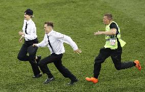 Football: Pitch-invasion protest at World Cup final