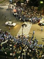 10,000 protest in Tokyo over security policy change