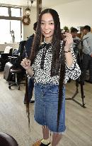 Japanese woman cuts hair once recognized as longest for teen