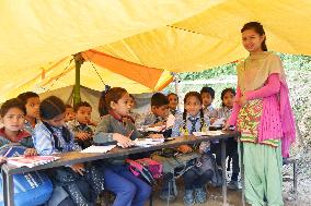 Pupils study at tent school in quake-hit Nepal