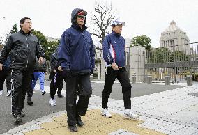 PM Aso goes on 1st walk after moving to official residence