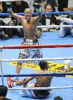 Kameda 1st Japanese boxer to win 3 world titles