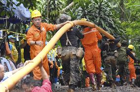 Boys, football coach missing in Thai cave