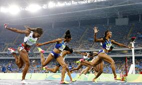 Olympics: Rollins leaps to gold in women's 100m hurdles