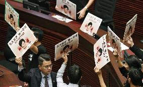 Hong Kong lawmakers protest