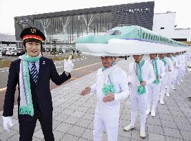 People sport Hokkaido Shinkansen train headwear to celebrate