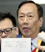 Hon Hai declares itself as preferred bidder, Sharp denies