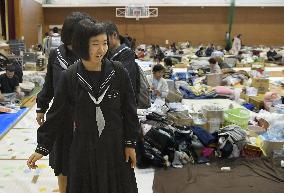 Students head to school from shelter