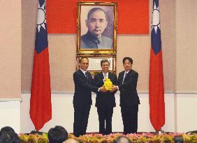 Taiwan's new premier sworn in, promises "pragmatic" Cabinet