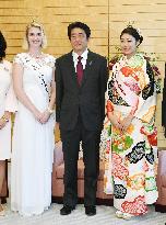 Japanese, U.S. cherry blossom queens meet PM Abe