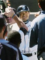 Ichiro homers twice, breaks record in Seattle victory