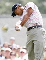 Woods hits tee shot during 1st round of Masters tournament
