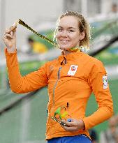 Olympic scenes: Dutch cyclist Van der Bruggen wins gold