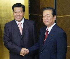 Chinese leader Jia Qinglin meets with Japan's opposition leader