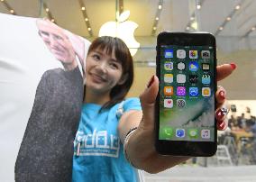 Apple's new iPhones go on sale in Japan