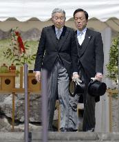 Emperor Akihito visits late father's mausoleum