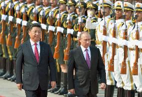Xi welcomes Putin in Beijing