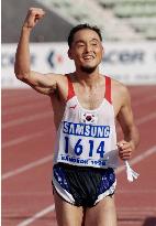 Olympic runner-up Lee takes Asian Games marathon crown